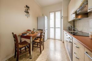 Køkken eller tekøkken på Italian Experience- Lory House