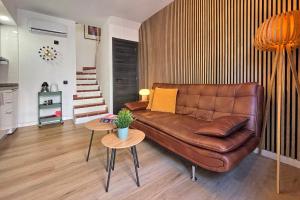 Χώρος καθιστικού στο Cosy Bungalow Green Oasis