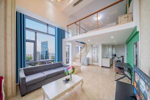 Φωτογραφία από το άλμπουμ του April Fair Duplex Apartment Guangzhou South Railway Station Ao Yuan Yue Shi Dai Branch στο Γκουανγκζού