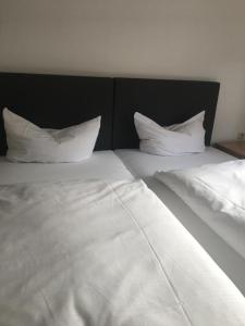 Postel nebo postele na pokoji v ubytování Hotel Relax