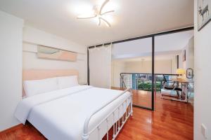 Φωτογραφία από το άλμπουμ του April Fair Duplex Apartment Guangzhou South Railway Station Ao Yuan Yue Shi Dai Branch στο Γκουανγκζού