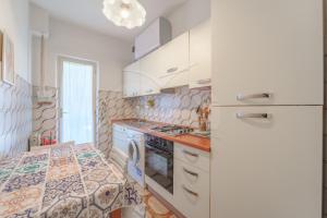 Kuchyň nebo kuchyňský kout v ubytování Casa Floretta - Goelba + 18 fotografií