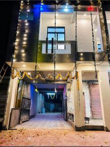 an empty hallway of a building with lights at R K Guest House Nimbi in Jaipur