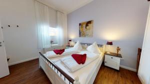 Katil atau katil-katil dalam bilik di Luise in der Villa Neptun