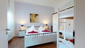 Katil atau katil-katil dalam bilik di Luise in der Villa Neptun +9 gambar