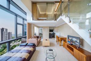 Φωτογραφία από το άλμπουμ του April Fair Duplex Apartment Guangzhou South Railway Station Ao Yuan Yue Shi Dai Branch στο Γκουανγκζού