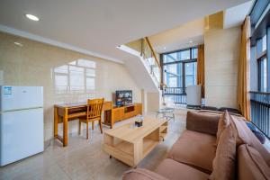 Φωτογραφία από το άλμπουμ του April Fair Duplex Apartment Guangzhou South Railway Station Ao Yuan Yue Shi Dai Branch στο Γκουανγκζού