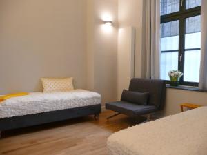 Postel nebo postele na pokoji v ubytování aTa & oMo 2 + 16 fotografií