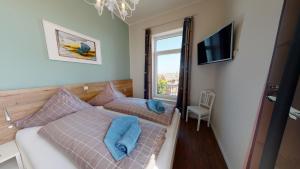 Μια τηλεόραση ή/και κέντρο ψυχαγωγίας στο Gretje in der Villa Patricia