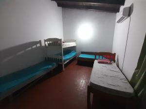 Postel nebo postele na pokoji v ubytování Quintana