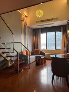 Φωτογραφία από το άλμπουμ του April Fair Duplex Apartment Guangzhou South Railway Station Ao Yuan Yue Shi Dai Branch στο Γκουανγκζού
