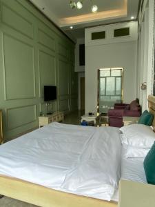 Φωτογραφία από το άλμπουμ του April Fair Duplex Apartment Guangzhou South Railway Station Ao Yuan Yue Shi Dai Branch στο Γκουανγκζού