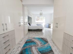 Ένα ή περισσότερα κρεβάτια σε δωμάτιο στο Greenacres