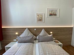 Katil atau katil-katil dalam bilik di Hiltje in der Villa Neptun
