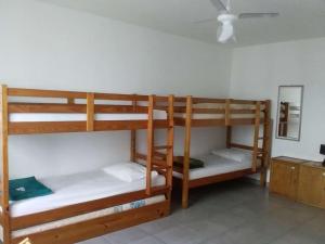 Postel nebo postele na pokoji v ubytování Spazio Itaúna Pousada + 5 fotografií