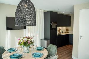 Η κουζίνα ή μικρή κουζίνα στο Natuur Villa met Hottub & Sauna | 5 personen +34 φωτογραφίες