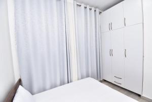 Φωτογραφία από το άλμπουμ του The Adams Apartment Kigali στο Κιγκάλι