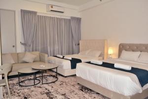 Posezení v ubytování MODERN SUITE SUNSURIA Setia Alam At Shah Alam + 37 fotografií