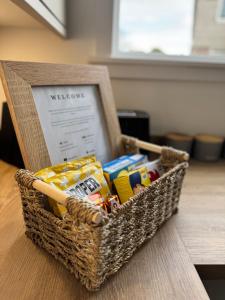 a wicker basket sitting on top of a table at Luxury 3 bed home in central Thurso - NC500 in Thurso