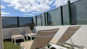 Balkón nebo terasa v ubytování Burrero Beach Stay - Sunshine
