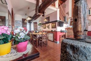 Nhà hàng/khu ăn uống khác tại Ferienhaus Palmento House In Piedimonte Etneo
