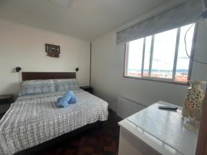 Postel nebo postele na pokoji v ubytování LOFT Glaciar Serrano