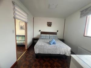 Postel nebo postele na pokoji v ubytování LOFT Glaciar Serrano