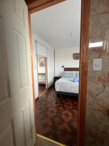 Postel nebo postele na pokoji v ubytování LOFT Glaciar Serrano
