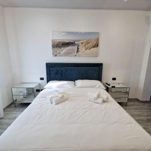 Letto o letti in una camera di House 21 Residence Room