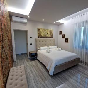 Letto o letti in una camera di House 21 Residence Room