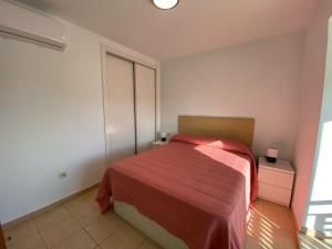 En eller flere senge i et værelse på Costa Adeje Luxury Property