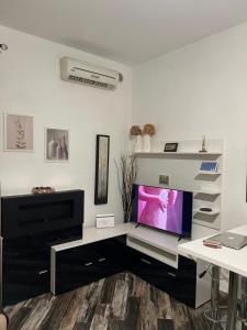 TV a/nebo společenská místnost v ubytování Casa Lavi