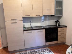 Dapur atau dapur kecil di Residence Borgo Trento +7 gambar