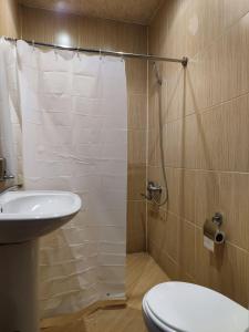 Ένα μπάνιο στο Palm Guesthouse