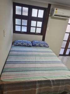 Ένα ή περισσότερα κρεβάτια σε δωμάτιο στο Micro Casa Kabanna
