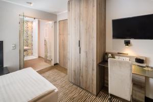 Letto o letti in una camera di Balland's Hotel & Restaurant