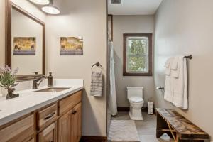 a bathroom with a sink and a toilet at Philipsburg Family & Couples Cabin Ski Hike Relax in Philipsburg +78 photos