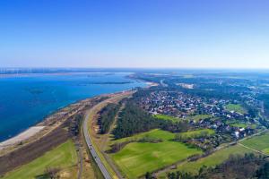 an aerial view of a town next to a body of water at SchaeBu! Appartment 1 Die Ostsee am Altmarkt in Cottbus +10 photos