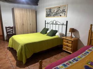 Ένα ή περισσότερα κρεβάτια σε δωμάτιο στο CASA M'GUIRE
