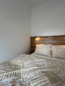 Ένα ή περισσότερα κρεβάτια σε δωμάτιο στο Apartament Kaszmir