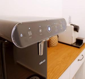 a close up of a toaster oven in a kitchen at Ha Meyasdim 51 in Zikhron Ya'akov