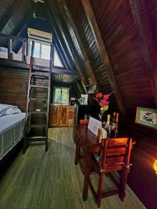 Postel nebo postele na pokoji v ubytování Cabaña Alpina