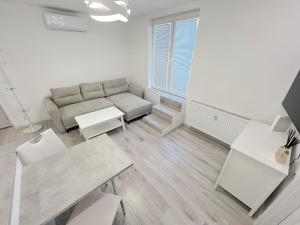 Χώρος καθιστικού στο Krásny byt - apartmán v Starom meste s terasou