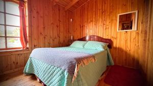 Postel nebo postele na pokoji v ubytování Cabaña Marquesana