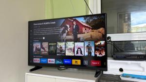 TV a/nebo společenská místnost v ubytování Résidence Le Clos de l'Anse