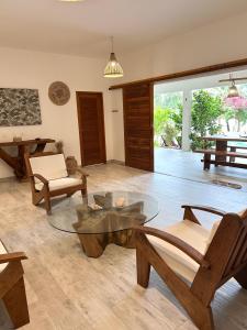 Khu vực ghế ngồi tại Casa charmosa na Barrinha (Prea) perto da Praia