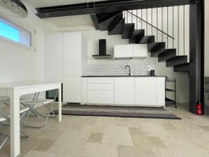 Kuchyň nebo kuchyňský kout v ubytování Piccola corte duplex