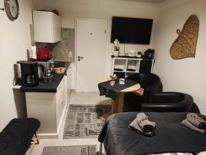 a small kitchen with a table in a room at Apartment Sweet Dreams in Hameln