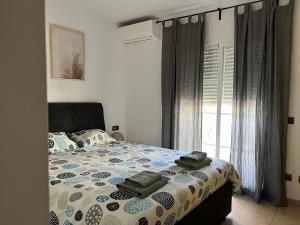 Posteľ alebo postele v izbe v ubytovaní NERJA 4 + 17 fotografií