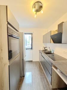 Η κουζίνα ή μικρή κουζίνα στο Schöne Maisonette im Villa 12-5 Uni Mainz +1 φωτογραφίες